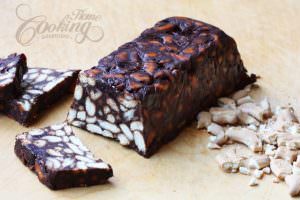 chocolate biscuit cake with cranberries and nuts