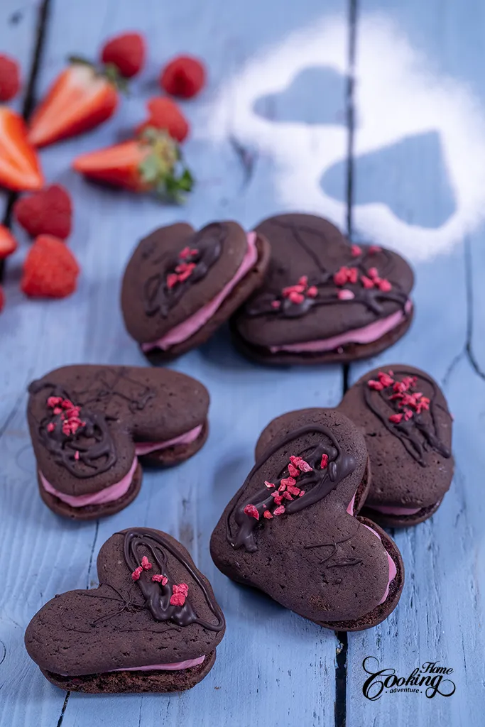 Valentine's Day chocolate raspberry whoopie pies with chocolate ganache filling and freeze dried raspberries