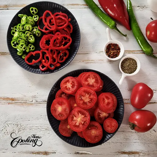 tomatoes and peppers cut into slices
