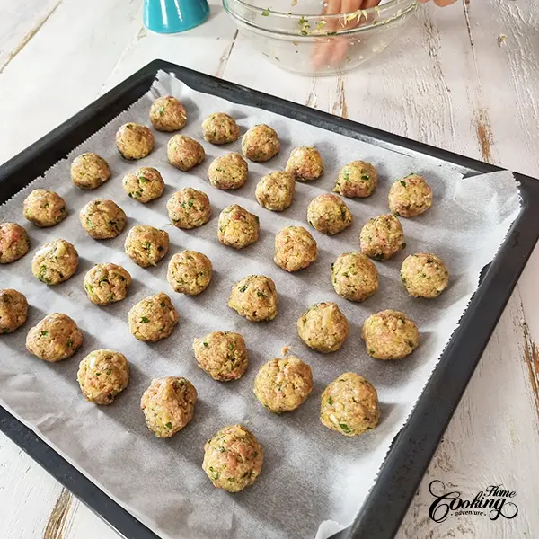 the meatballs on the baking sheet