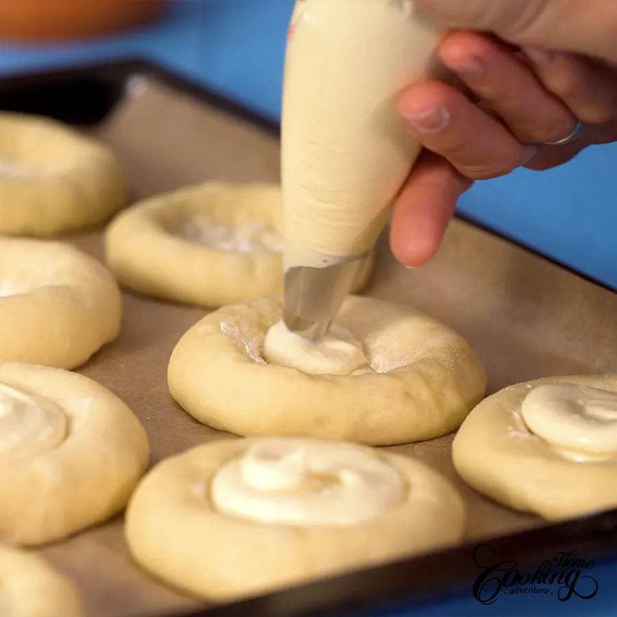 piping the cream cheese filling
