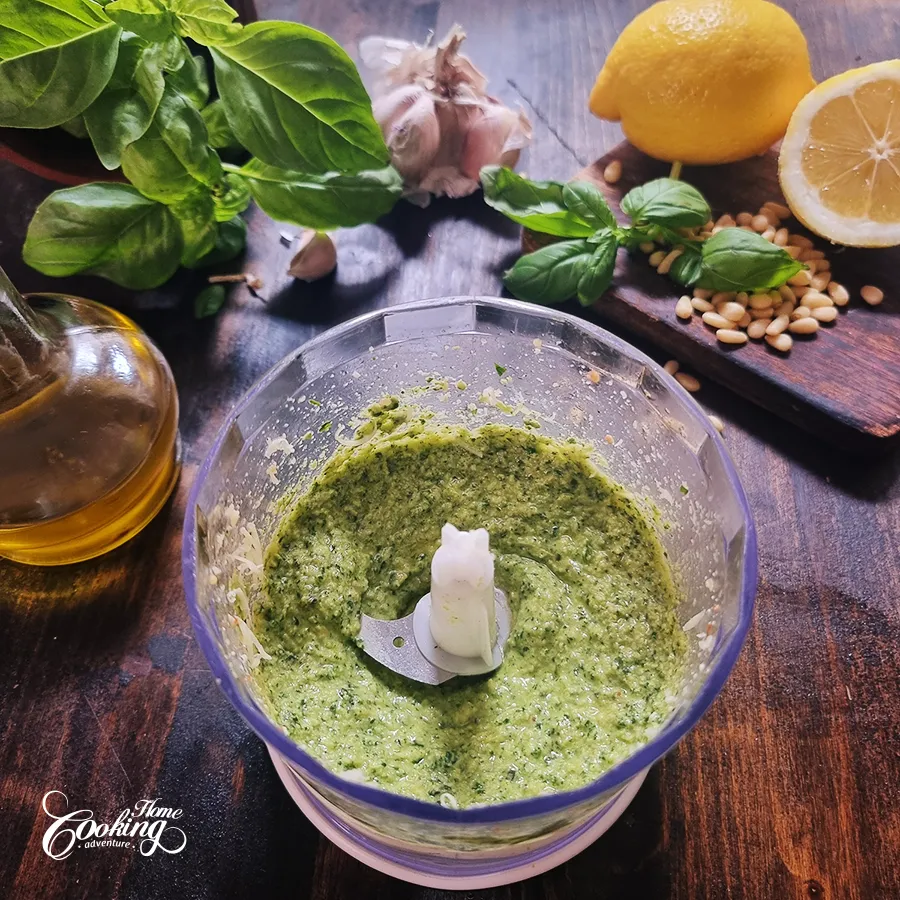 pesto steps - processing the basil mixture with Parmesan and olive oil