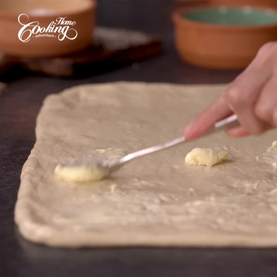 spread butter over the dough