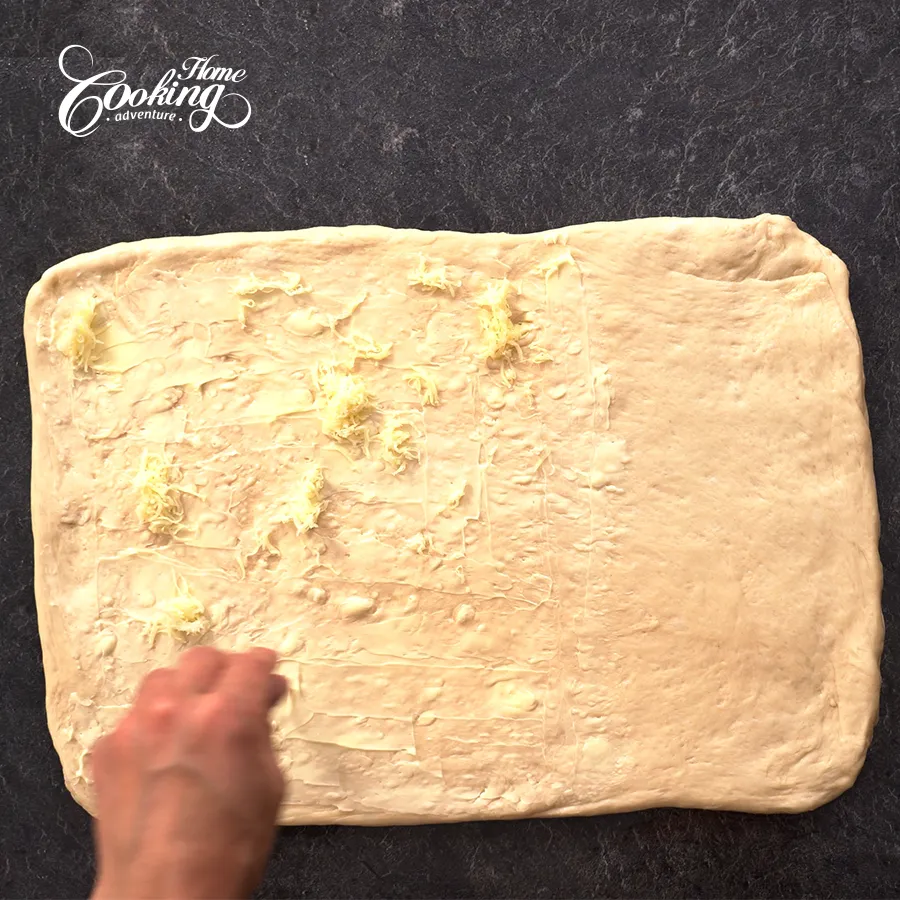spread cheese over the dough