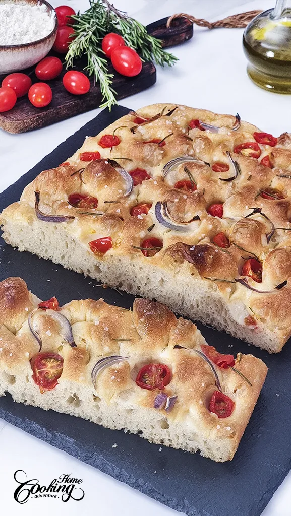Easy No-Knead Focaccia with tomatoes, red onion and rosemary