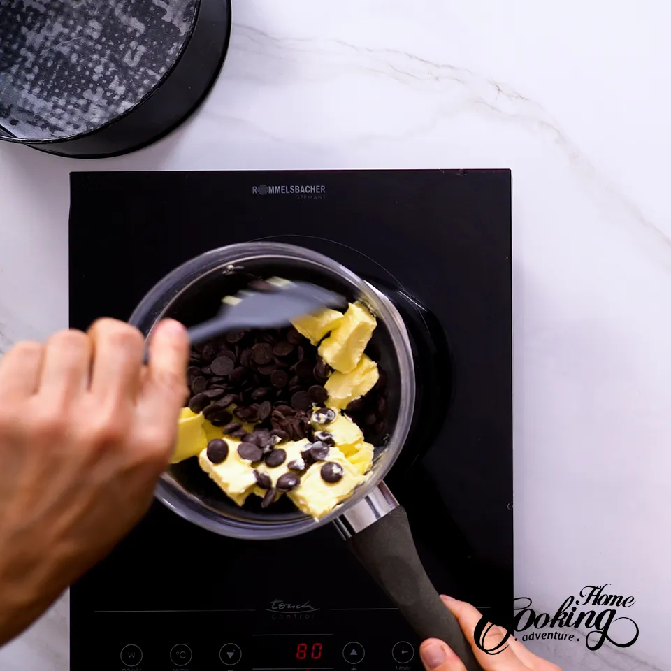 Chocolate Cranberry Cake melting chocolate