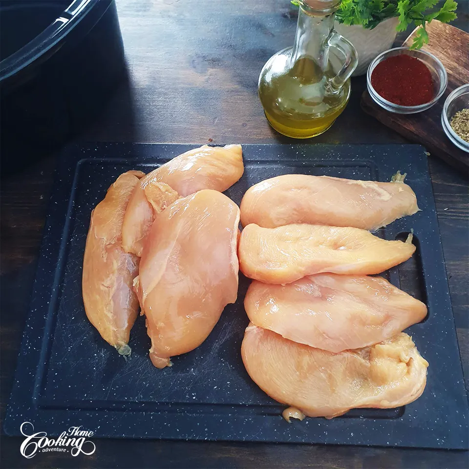 Slow Cooker - Crockpot Chicken Breast - cutting the chicken into halves