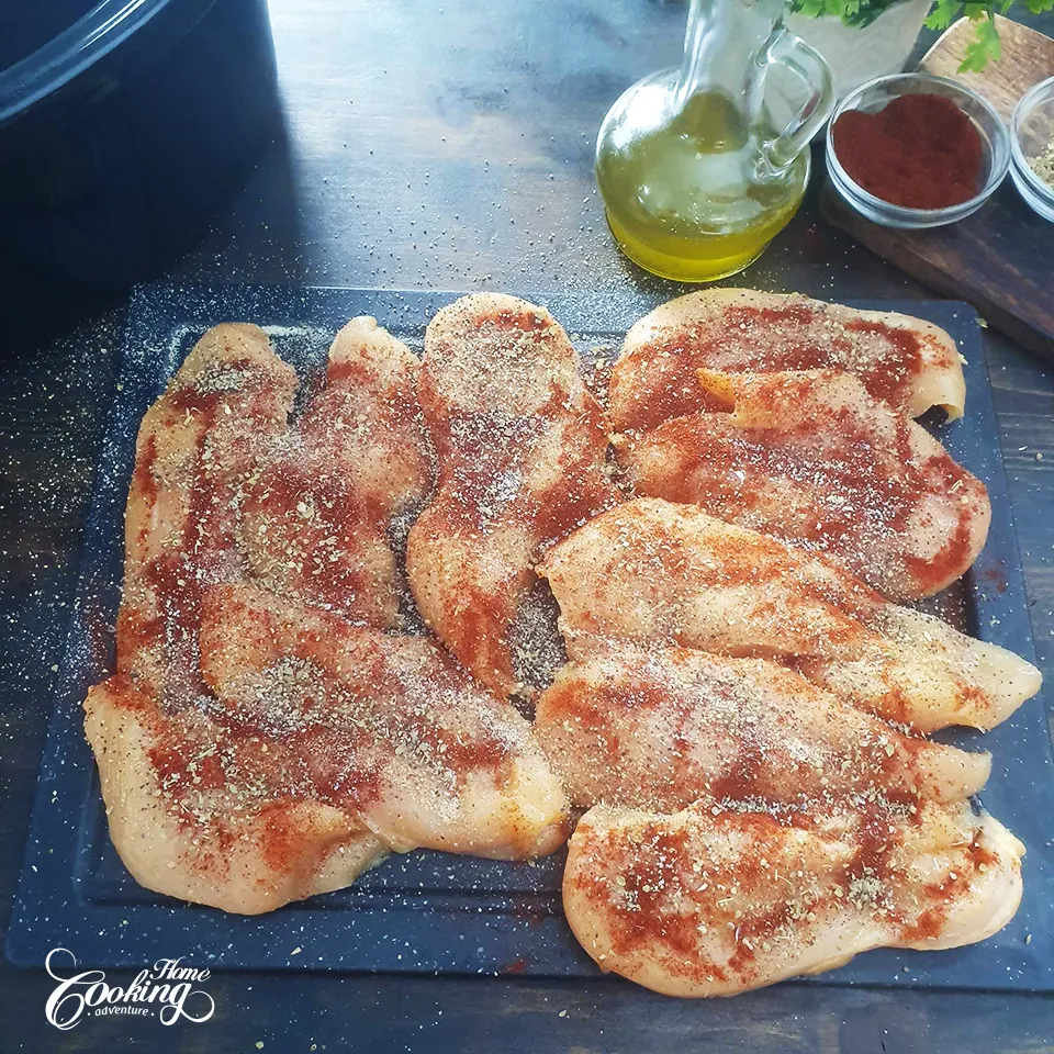 Slow Cooker Crockpot Chicken Breast - seasoning the chicken