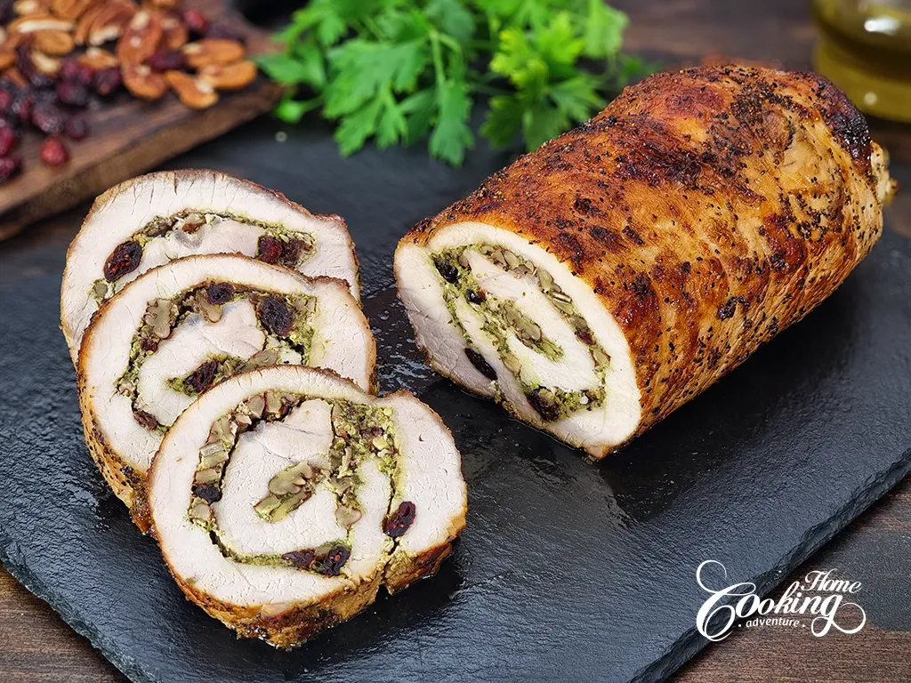 Stuffed Pork Loin with Spinach Pesto, Cranberries and Pecans