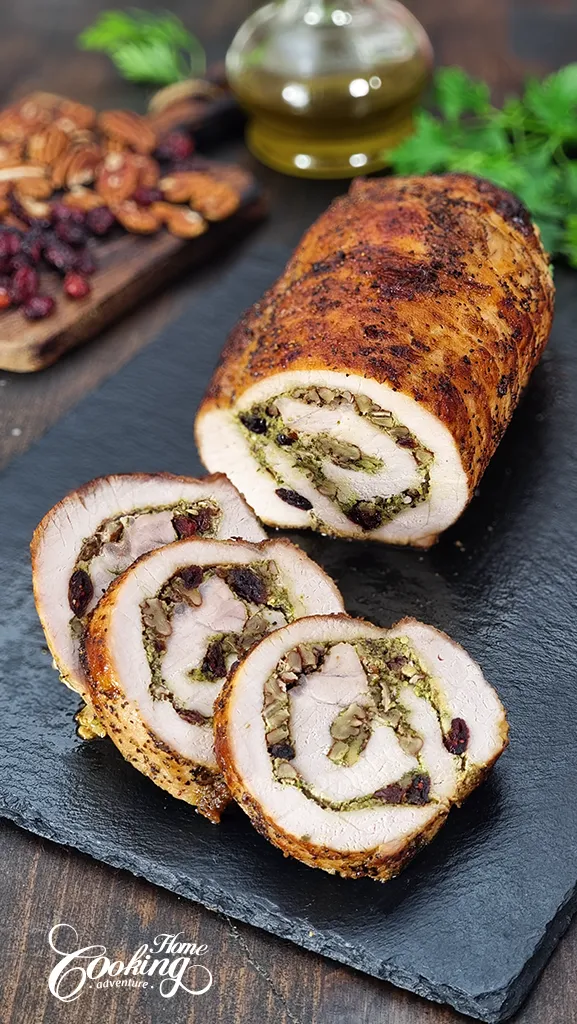 Stuffed Pork Loin with Spinach Pesto, Cranberries and Pecans