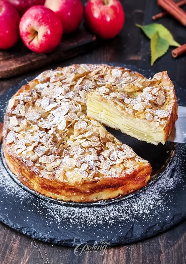 Apple Invisible Cake with almond flakes on top